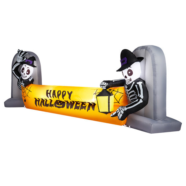 Angled view of skeleton inflatable banner and tombstone supports