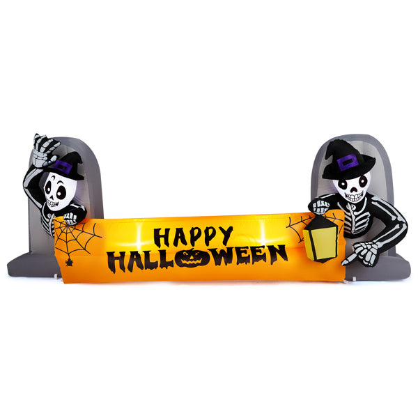 Front view of skeletons holding an orange Happy Halloween banner