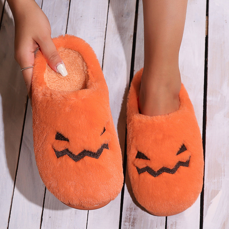 Close-up of pumpkin slippers and their soft lining