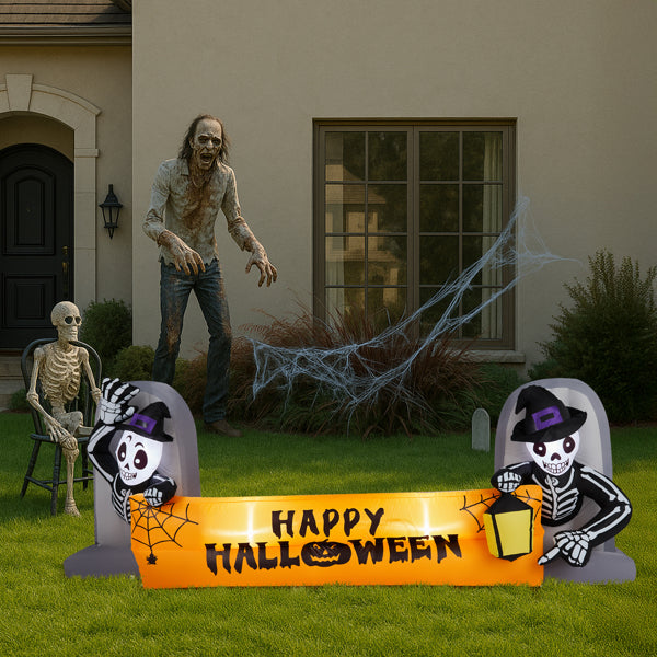 Skeleton inflatable banner in a decorated front yard